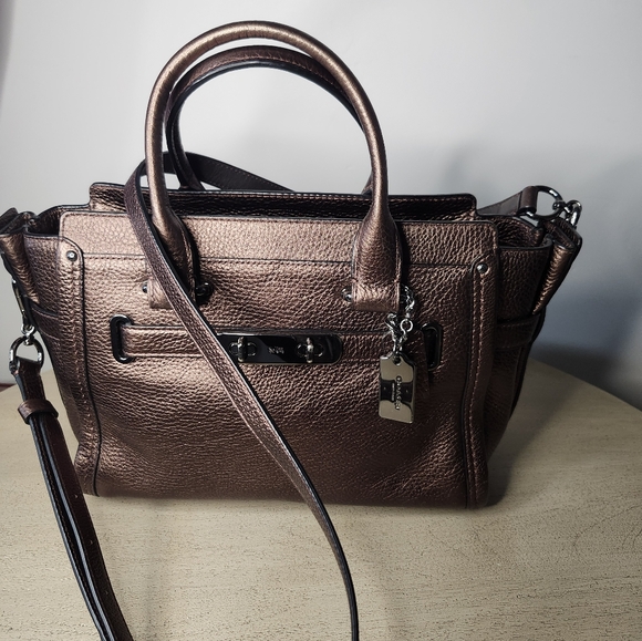Coach Handbags - Coach Swagger In Bronze Like New